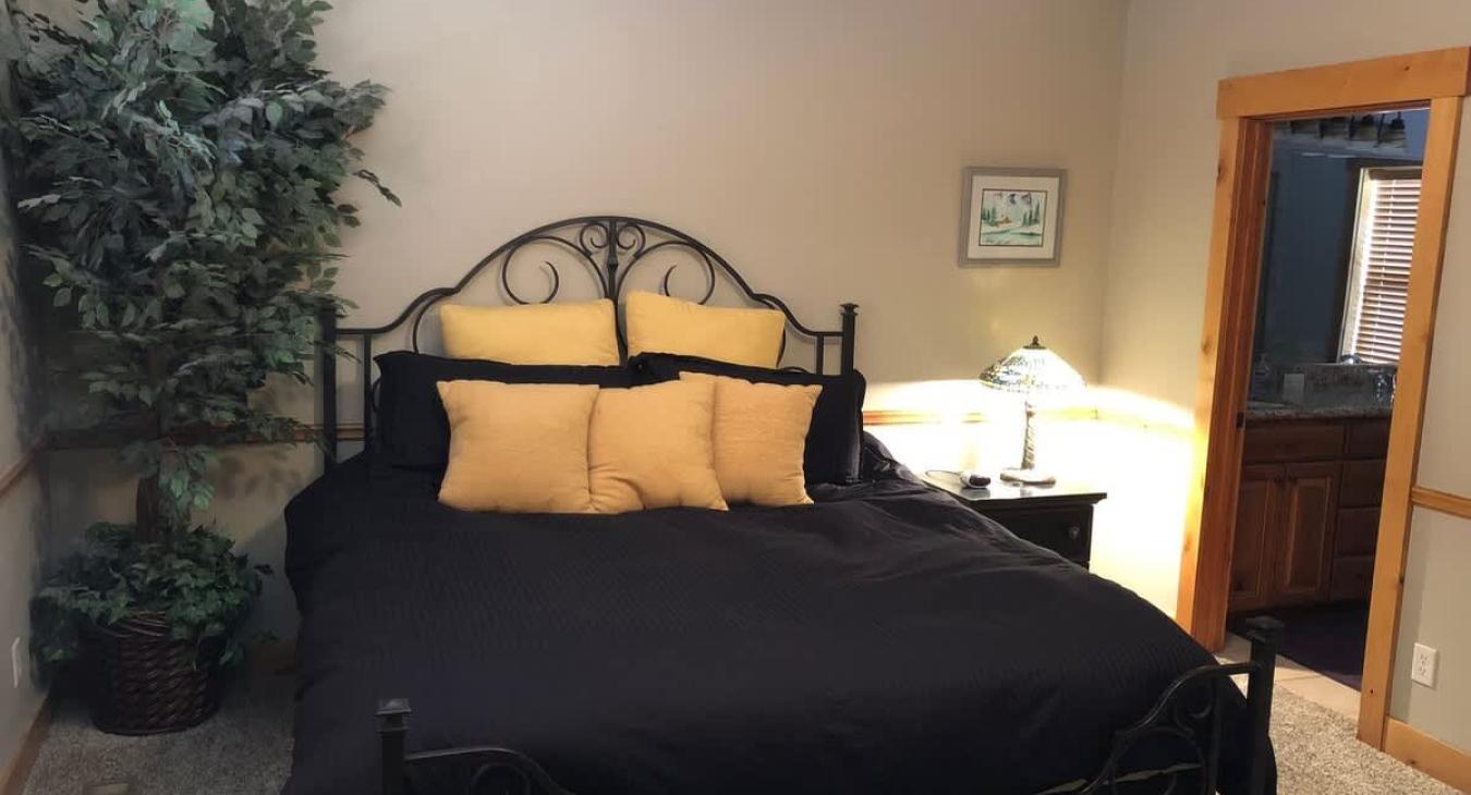 Main level master bedroom with a King size bed.