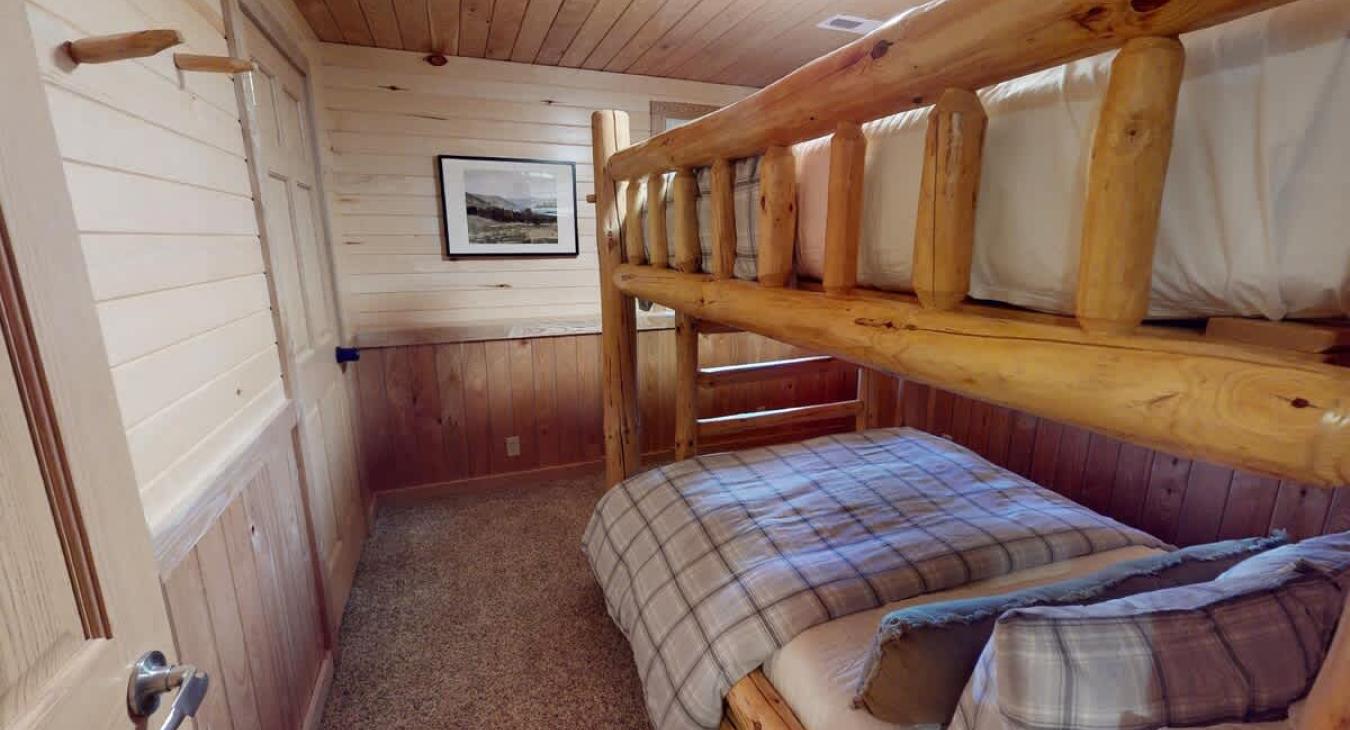 Bedroom #5 with a bunkbed with a Twin on top and Double on bottom.
