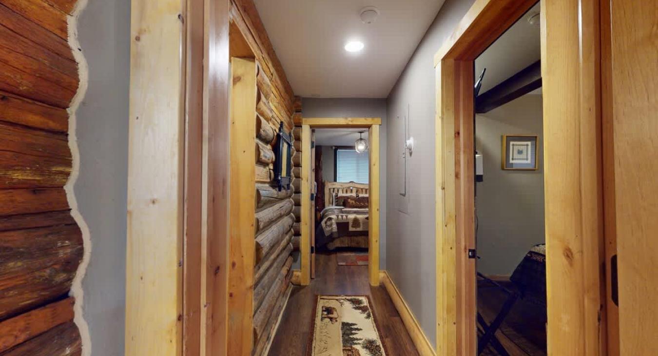 Hallway to access bathrooms and bedrooms on the main level.