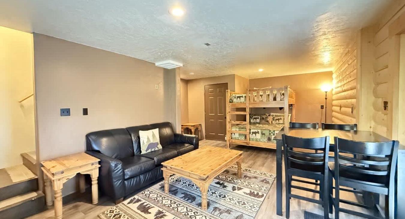 Small additional living area with seating and another bunk bed perfect for 2 more people.