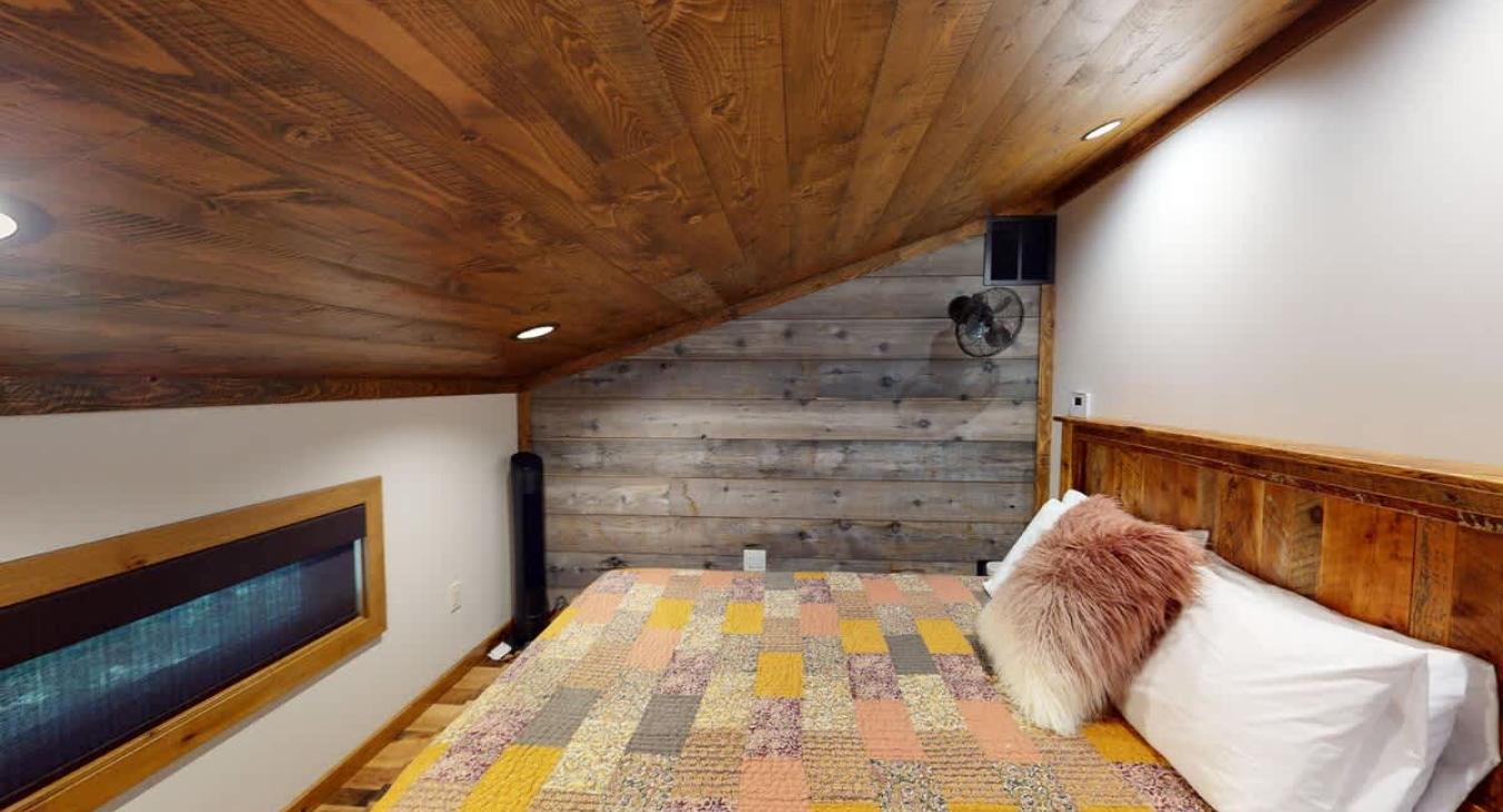 The loft bedroom as seen at the top of the stairs.