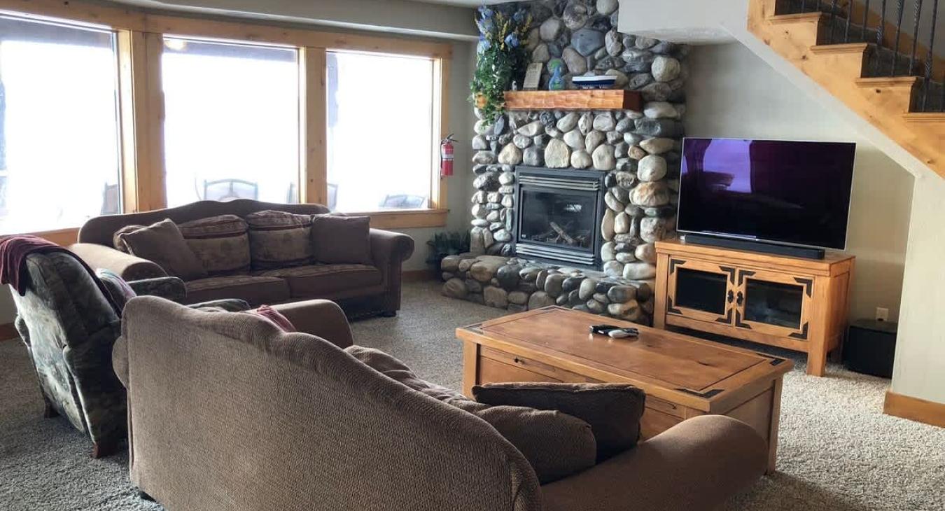 Cozy up by the fireplace during the cold months.