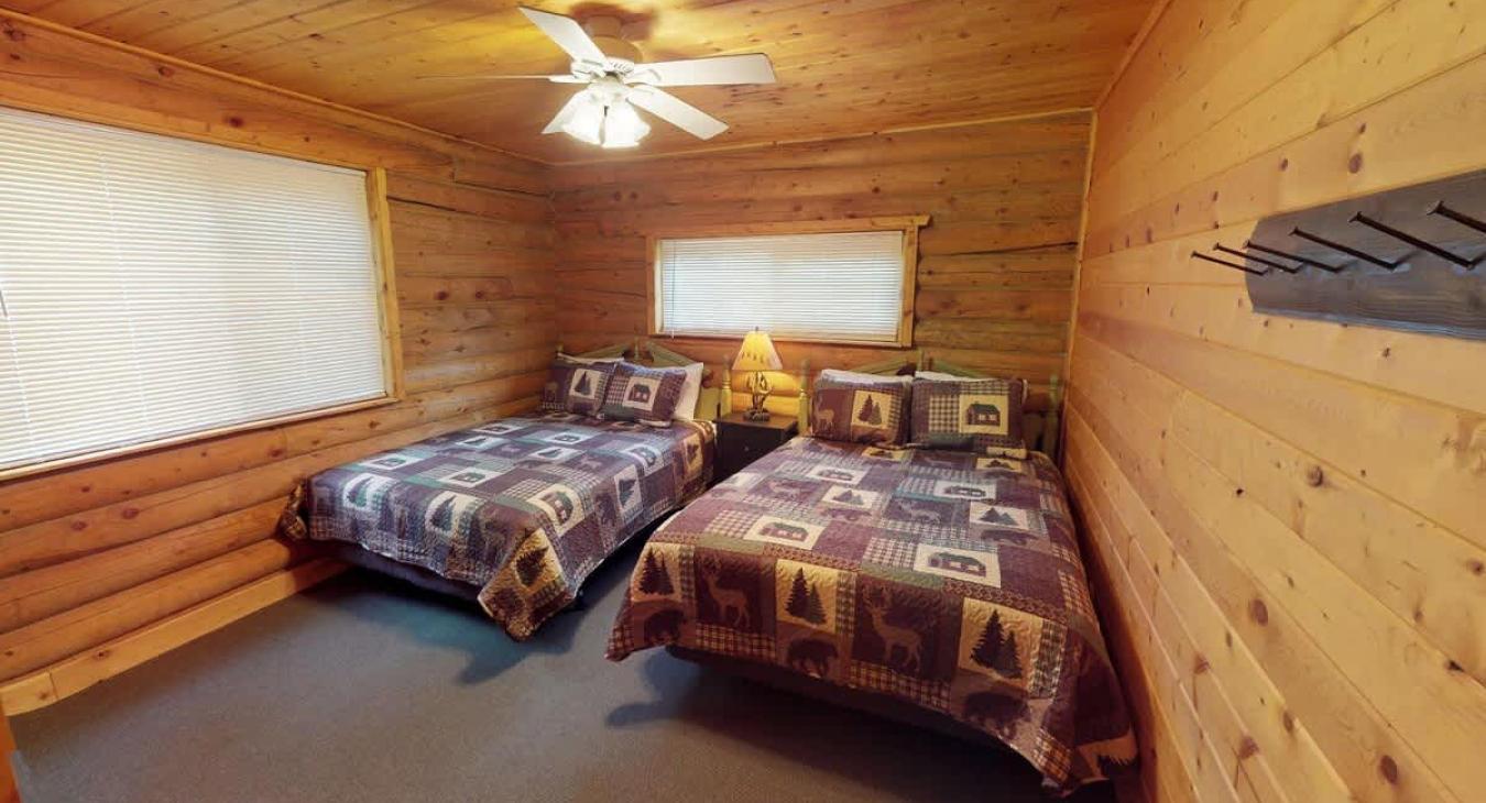 Bedroom #2 located upstairs with  2 Queen size bed.