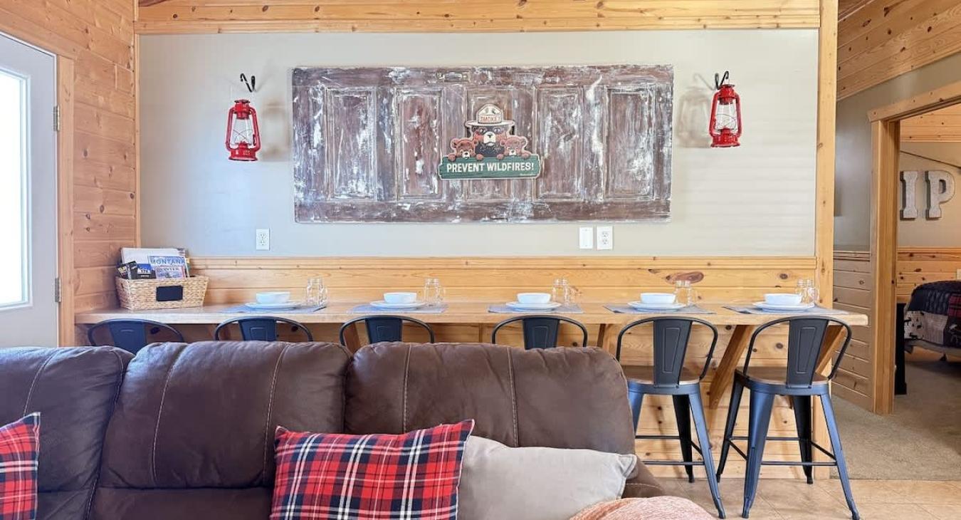 Just behind the main seating area, there’s a functional and stylish island that blends the kitchen and living space effortlessly.