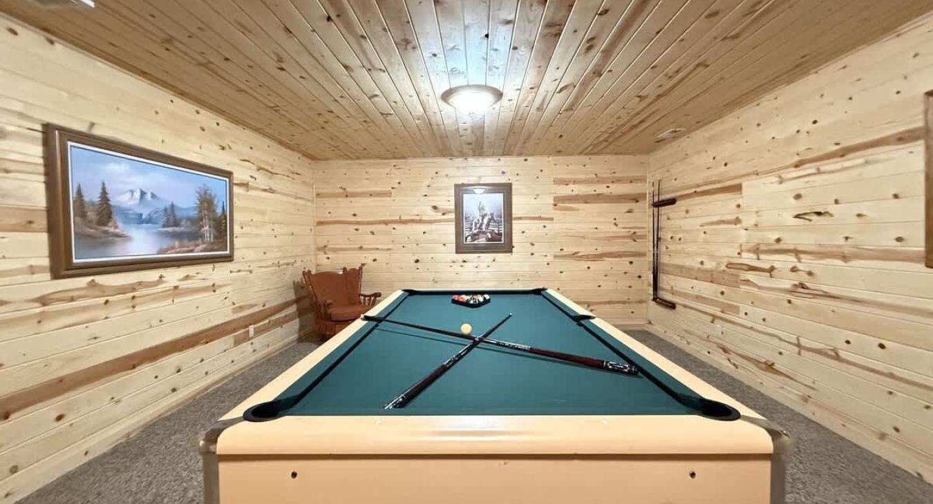 Downstairs game room with a Pool Table.