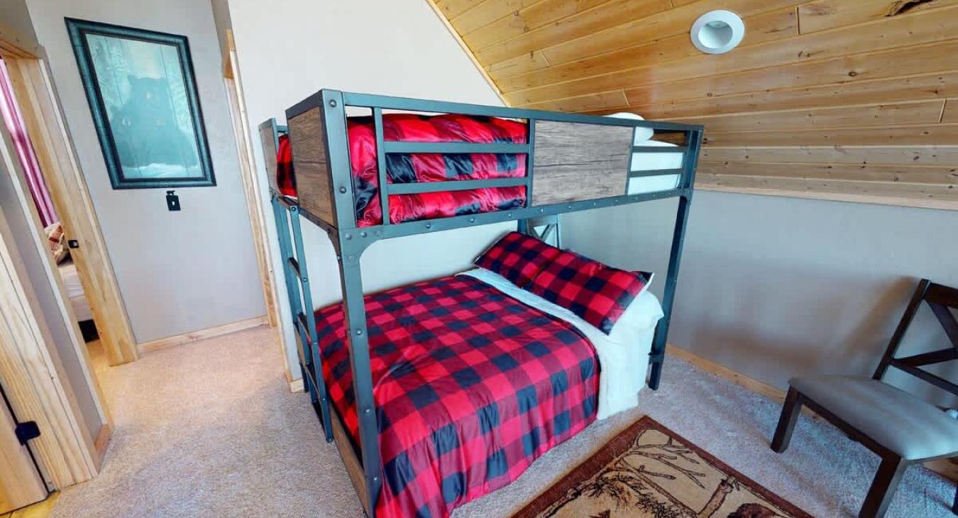 Upstairs loft is equipped with a bunk bed with a single and double bed. Perfect for up to 3 kids.