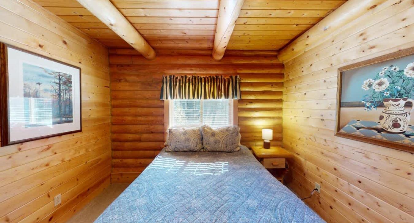 Bedroom #1 on the main floor with a Queen size bed.