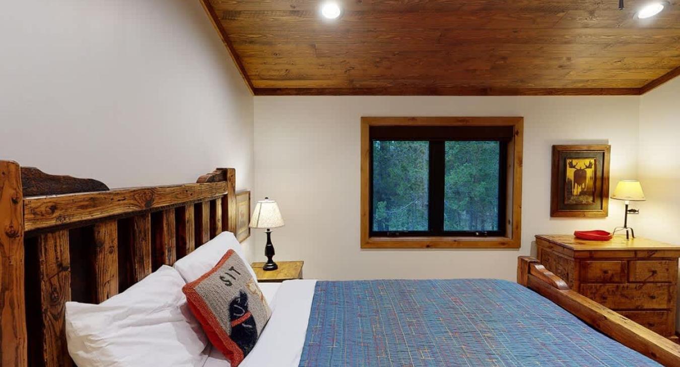 View of the window from the third bedrooms bedside.