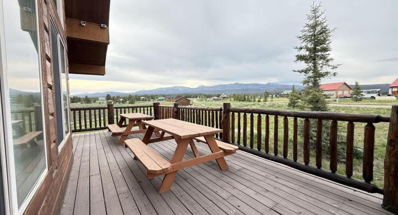 Seating outside on the deck to enjoy the view.