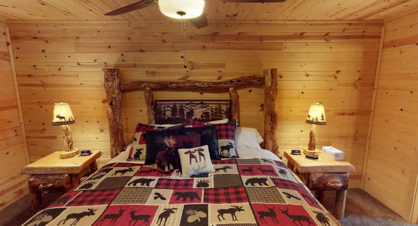 Bedroom #1 on the main level with a King size bed.