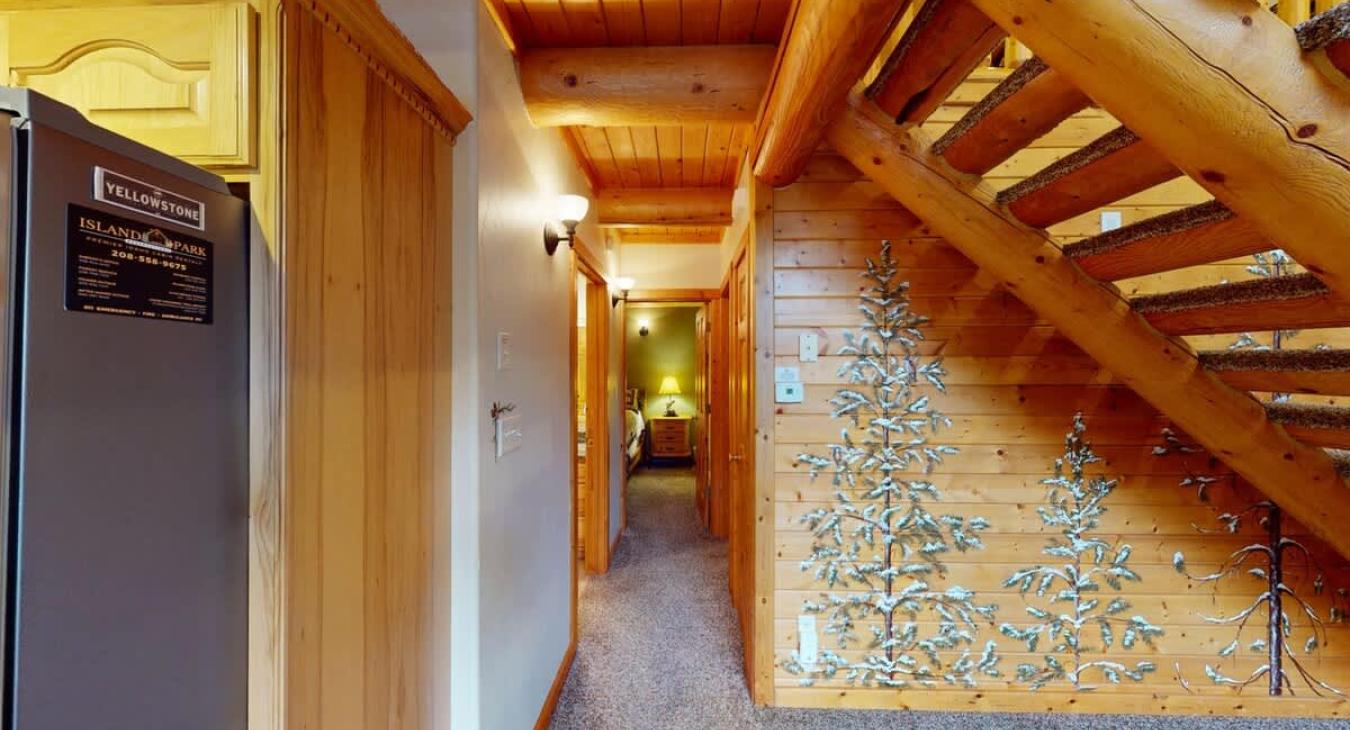 Downstairs hallway that gives you access to the bathroom and downstairs bedrooms.