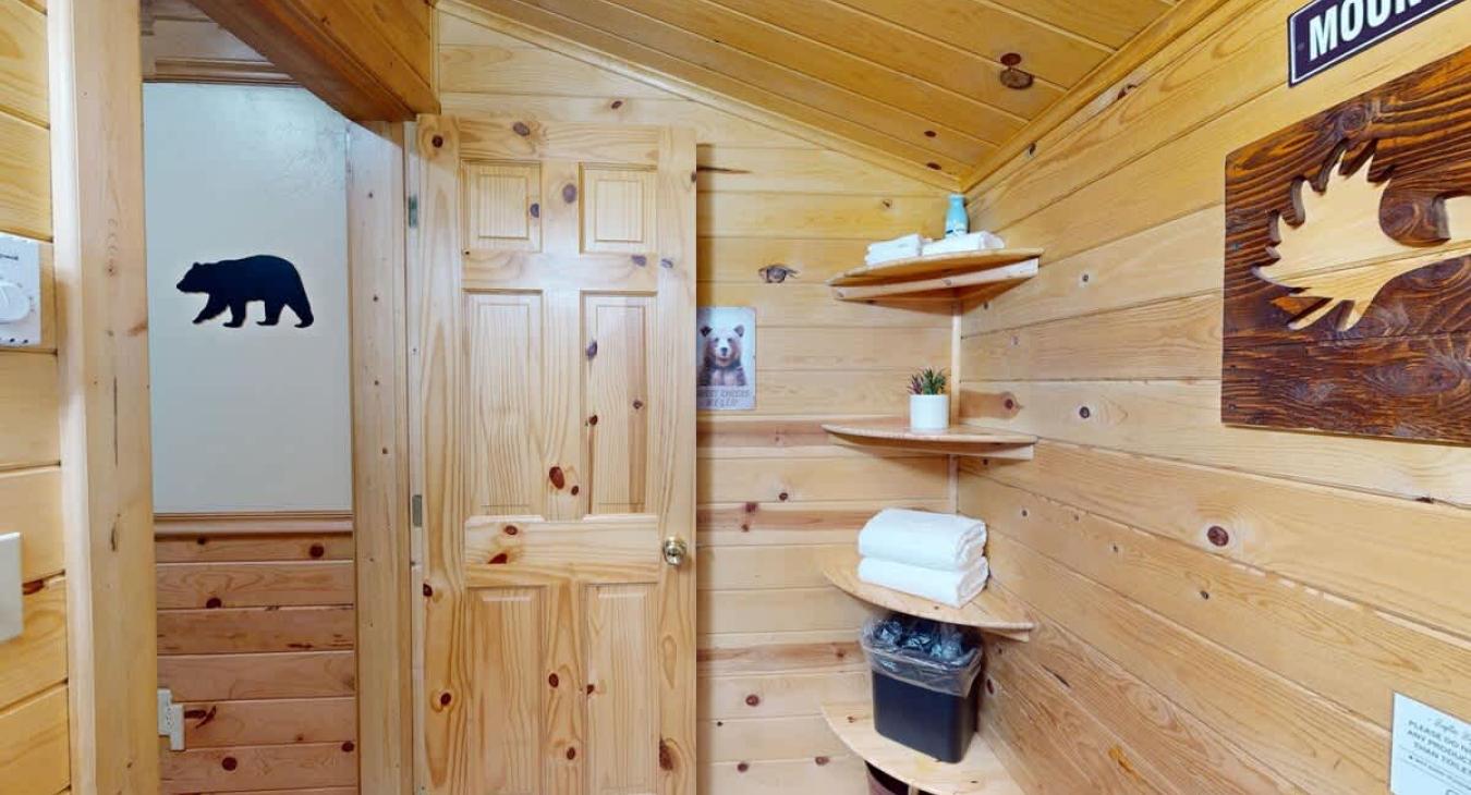 Open bathroom with plenty of space and storage.