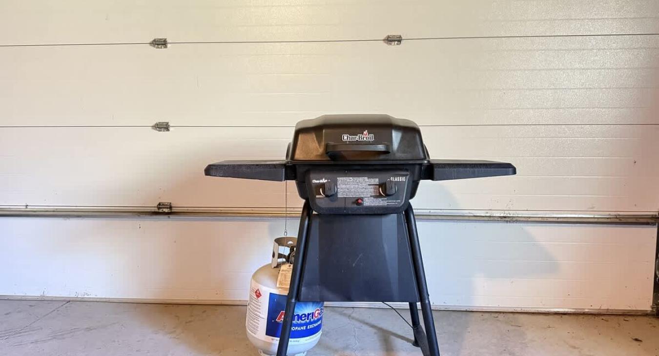 Propane grill in the garage