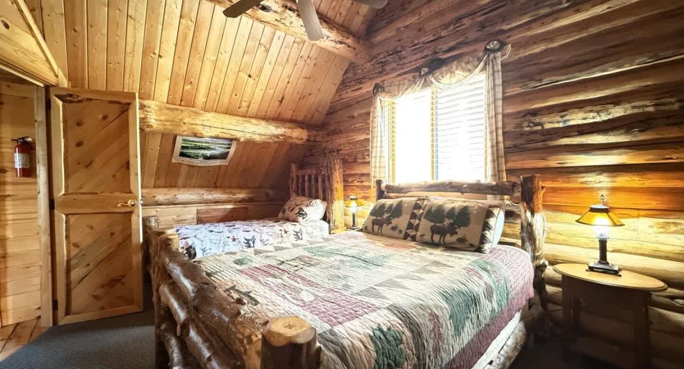 Bedroom #3 located upstairs with a Full and Twin bed.