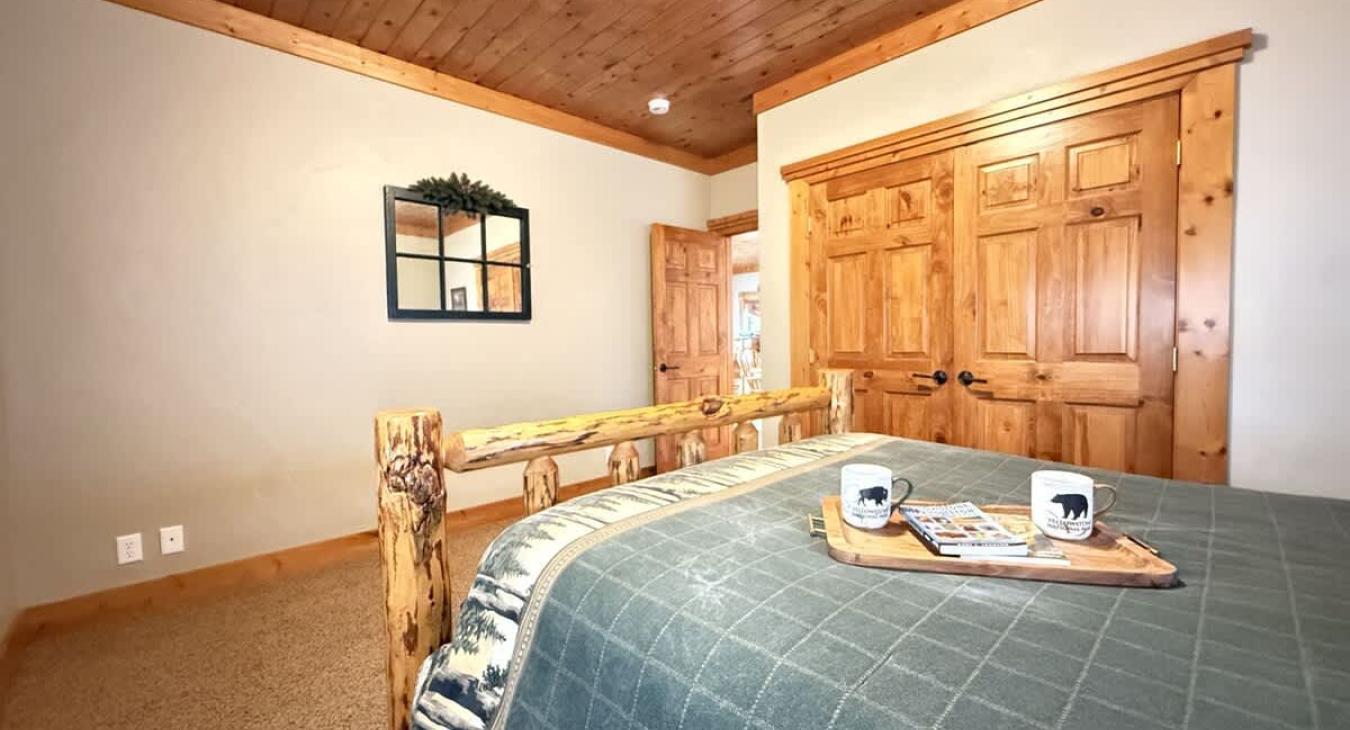 Master bedroom on the main floor with a Queen bed.