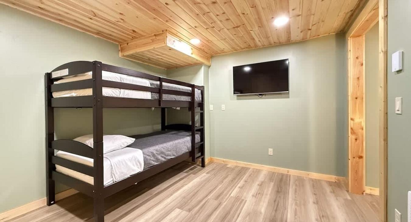 Bedroom off the king room in the basement with a bunk bed, perfect for 2 kiddos.