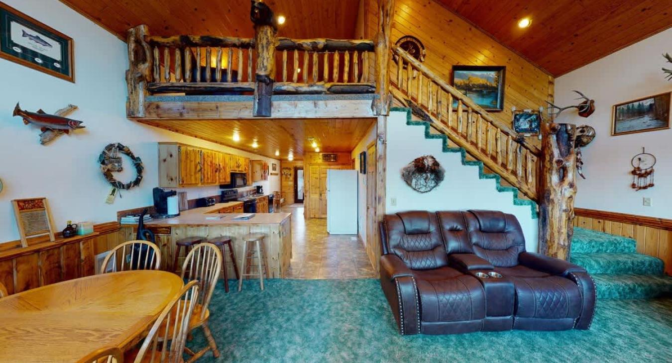 Adjacent to the living room is the dining table and kitchen.