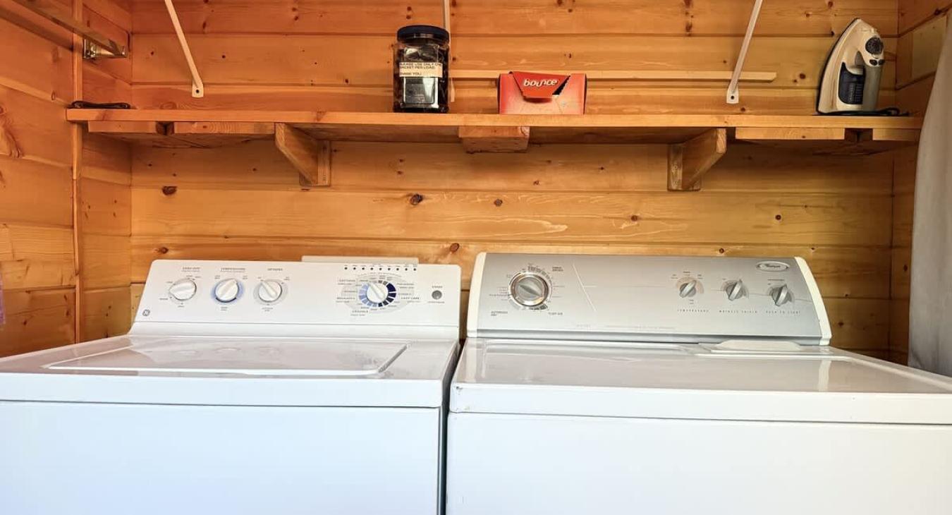 Full size washer and dryer located on the main level, laundry soap is provided.