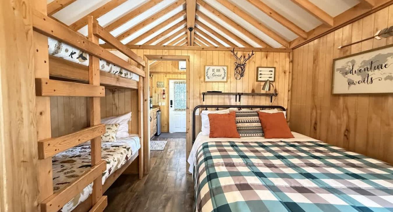 Along with the queen are two small bunkbeds for your little ones.