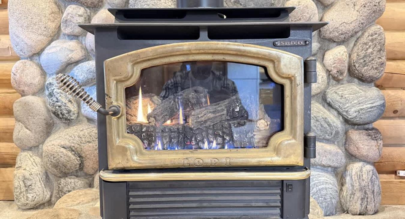 Warm up by the propane fireplace on those chilly summer evenings.