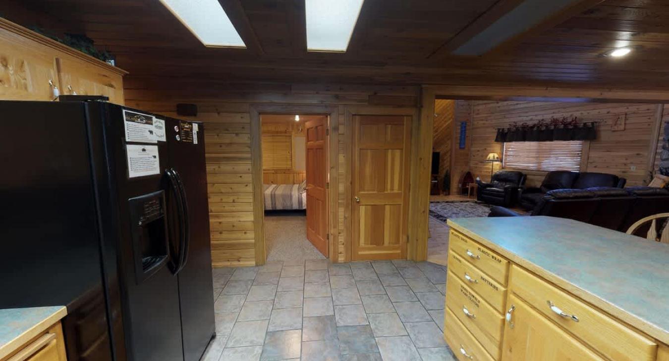 View from the kitchen looking towards the living room and one of the bedrooms.