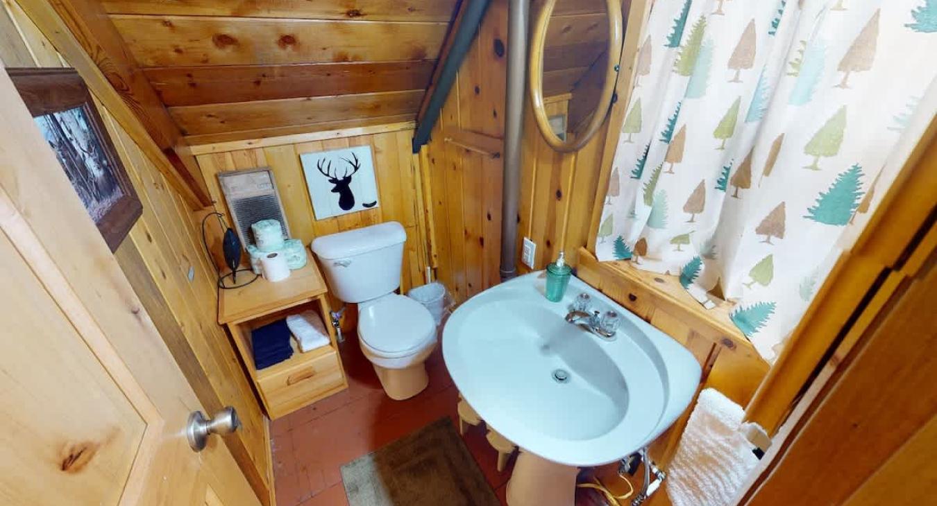 Half bathroom located upstairs.