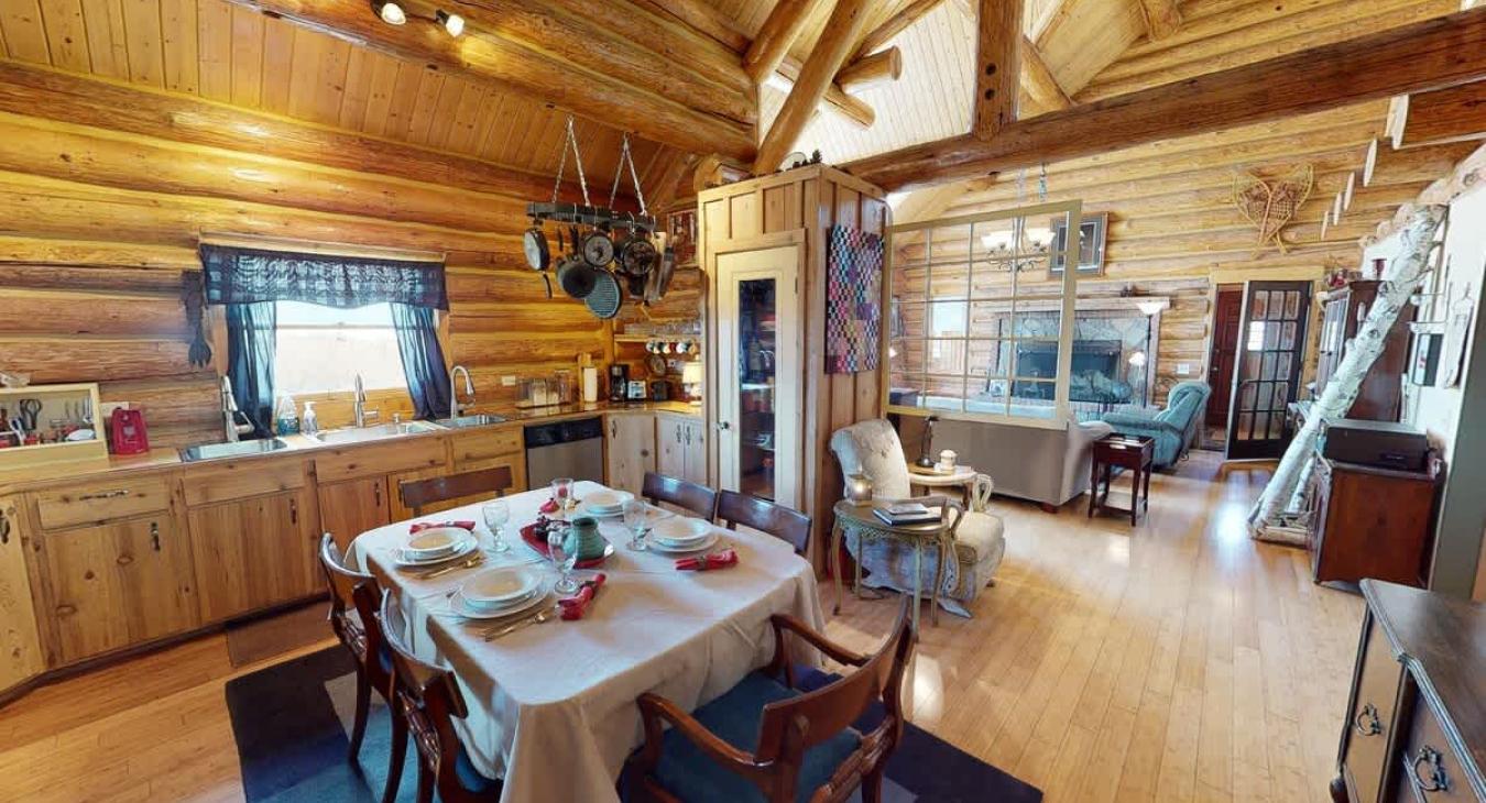 Dining table in the kitchen with 6 seats. Perfect to enjoy a home cooked meal.