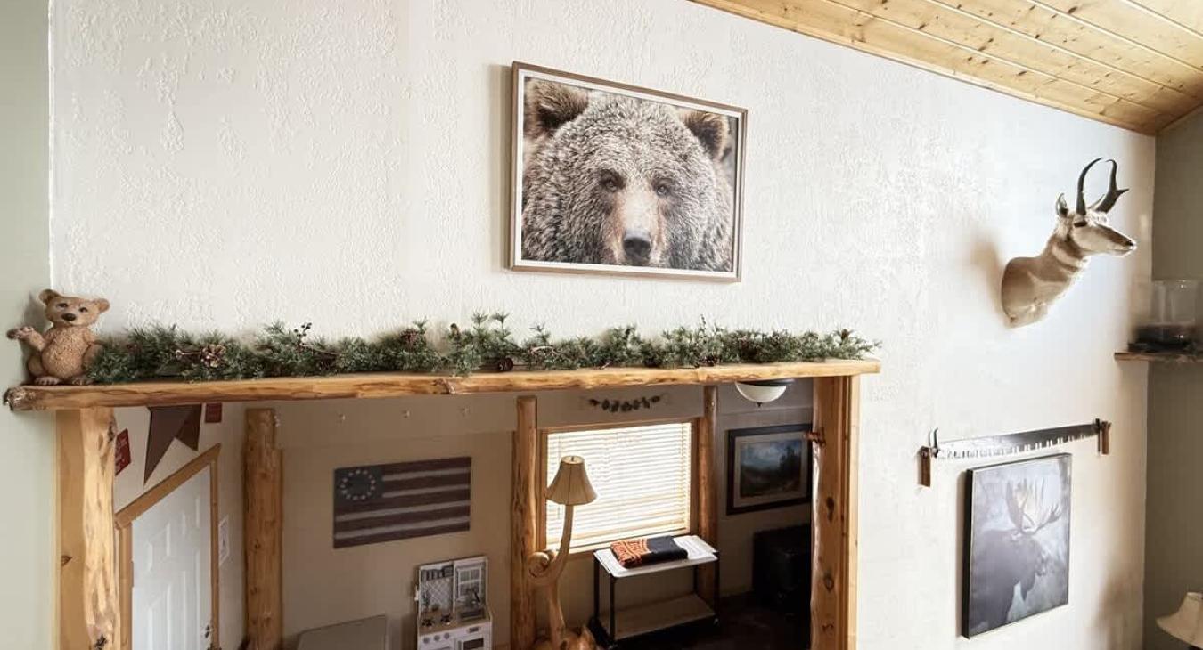 From the stairs you can view the entryway and the living room.