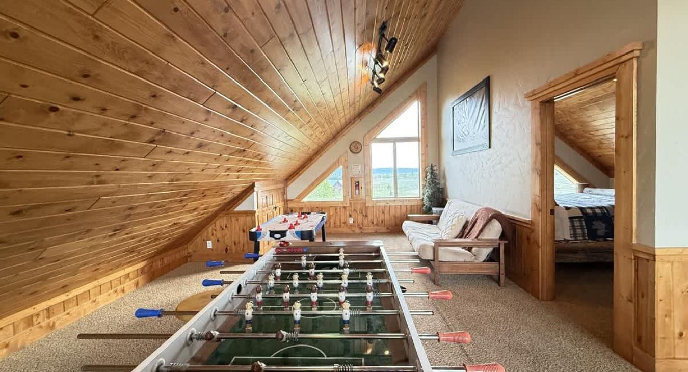 Full size futon for additional beds.