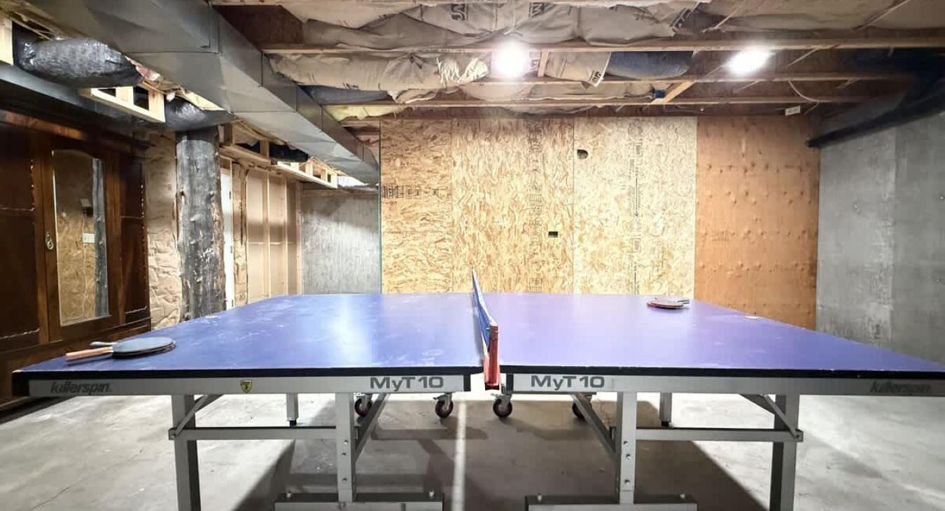 Ping pong table located downstairs.