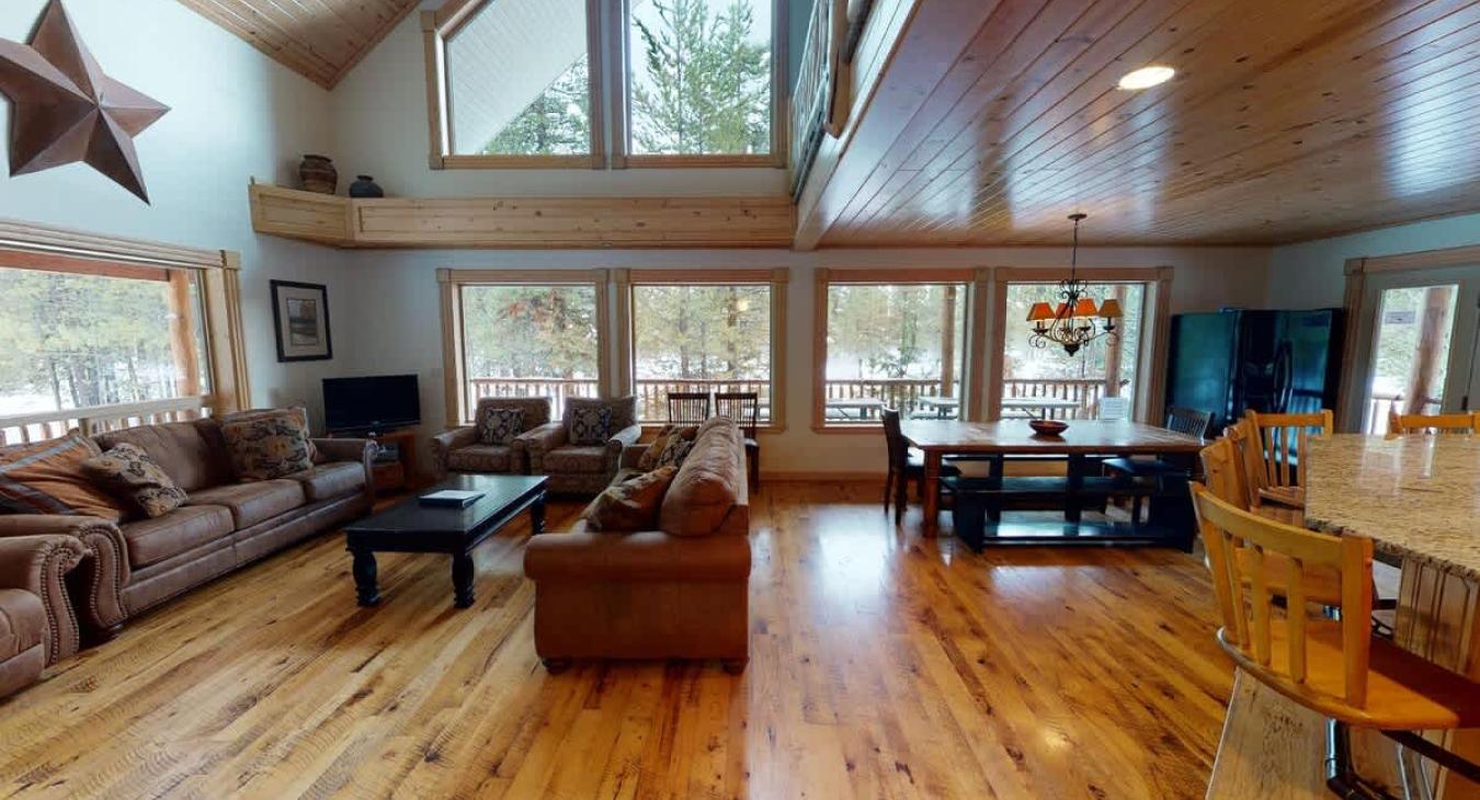 Main level living and dining area that is very open and flows into each other.