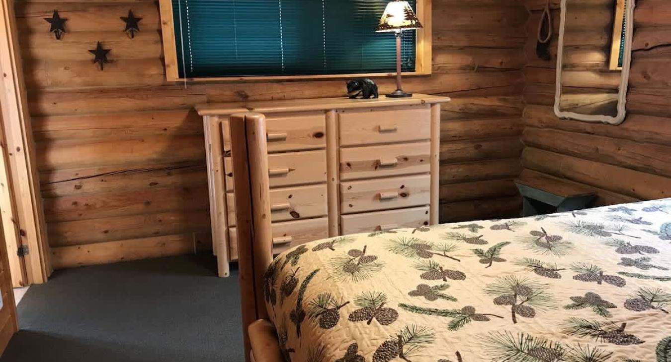 Store your belongings in the dresser pictured here.