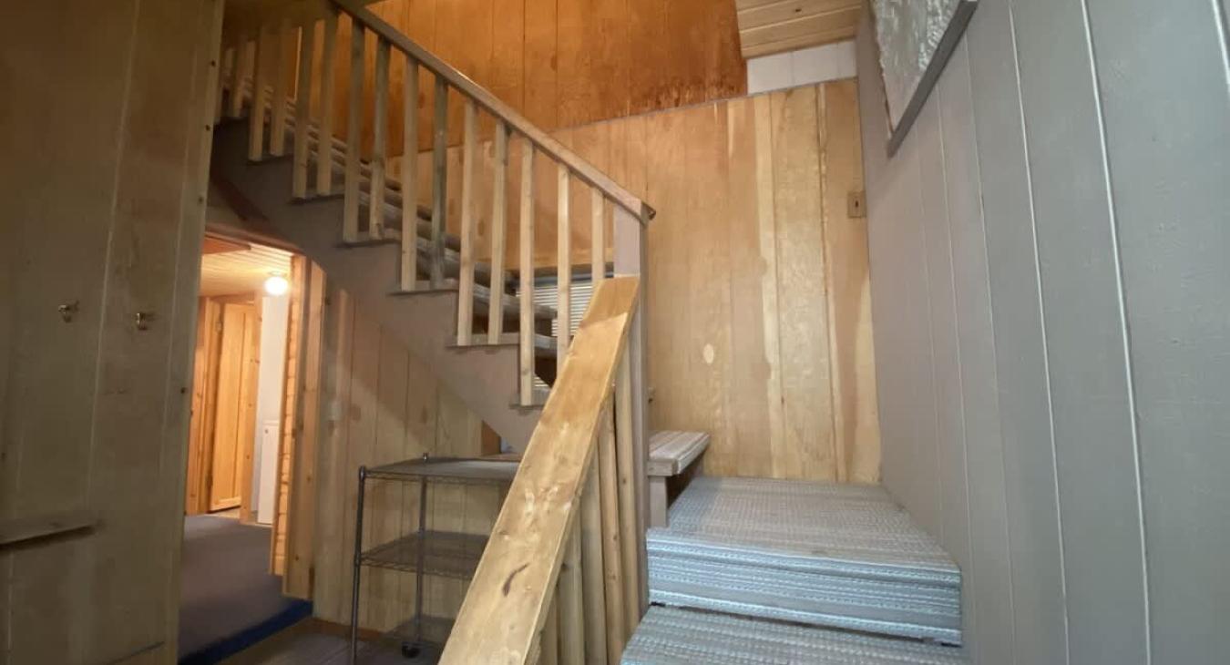 Access to the upstairs loft from the stairs.