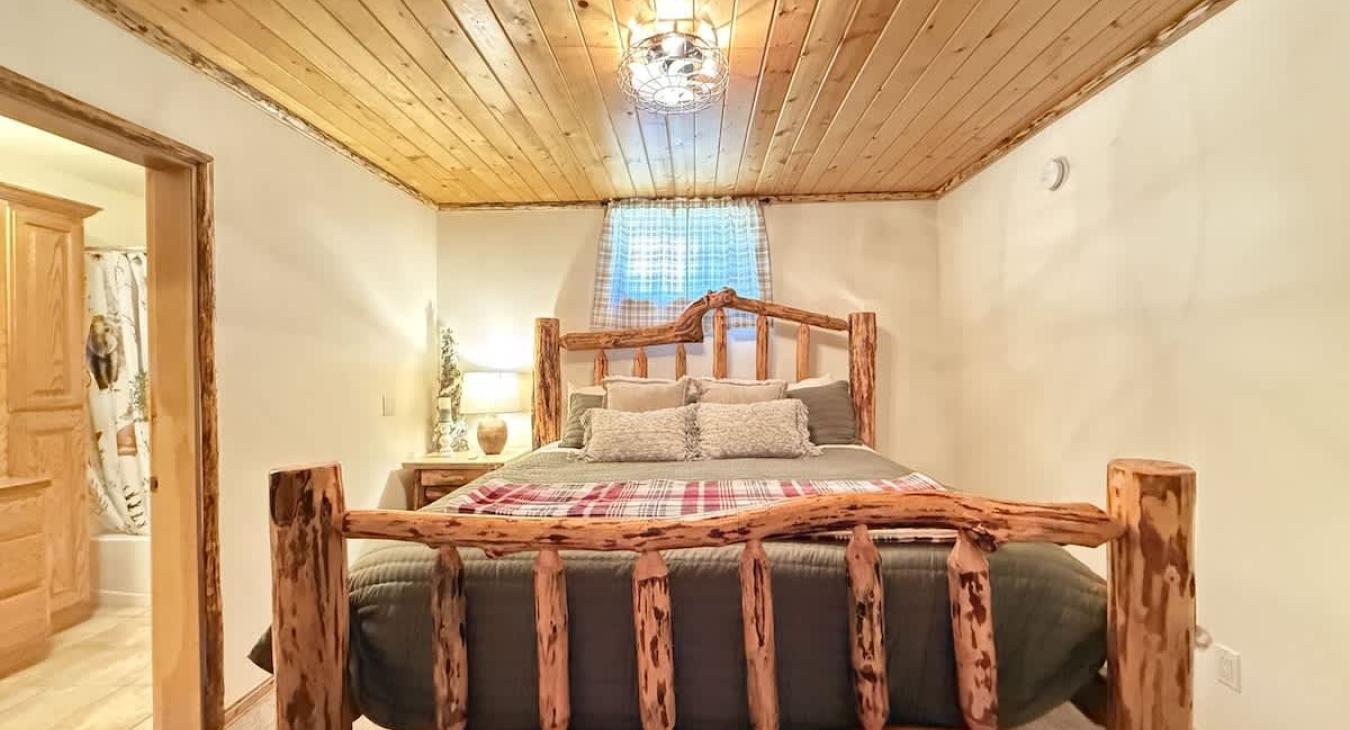 Master bedroom with a King size bed.