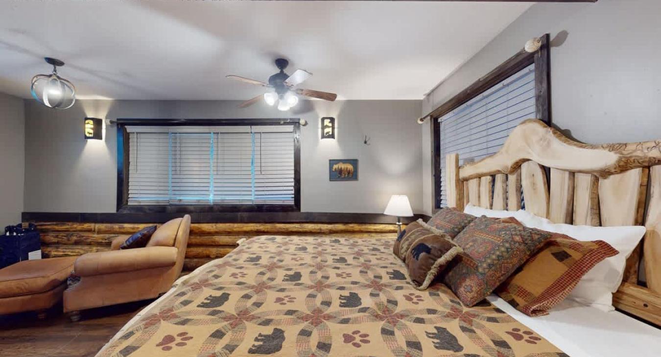 Bedroom #1 on the main level with a King size bed.