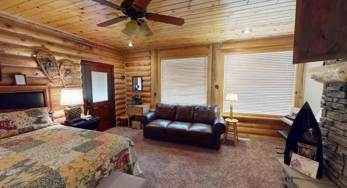 Located near the kitchen is the master bedroom with lots of open space to relax during your stay.