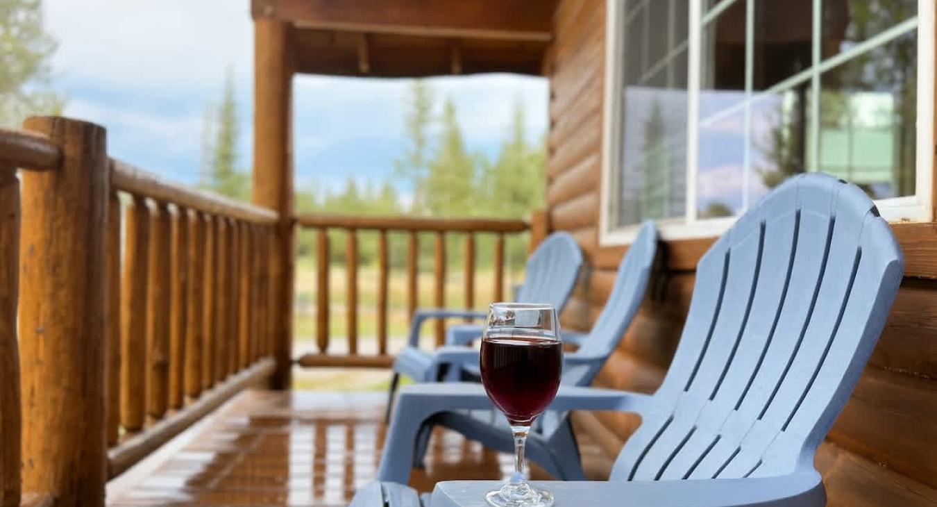 Porch with seating to enjoy the scenery.