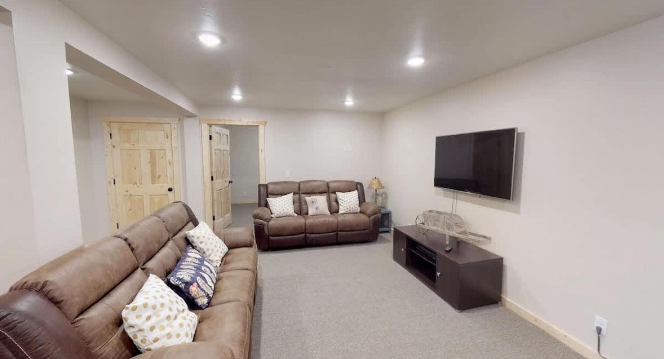 Basement living room area.