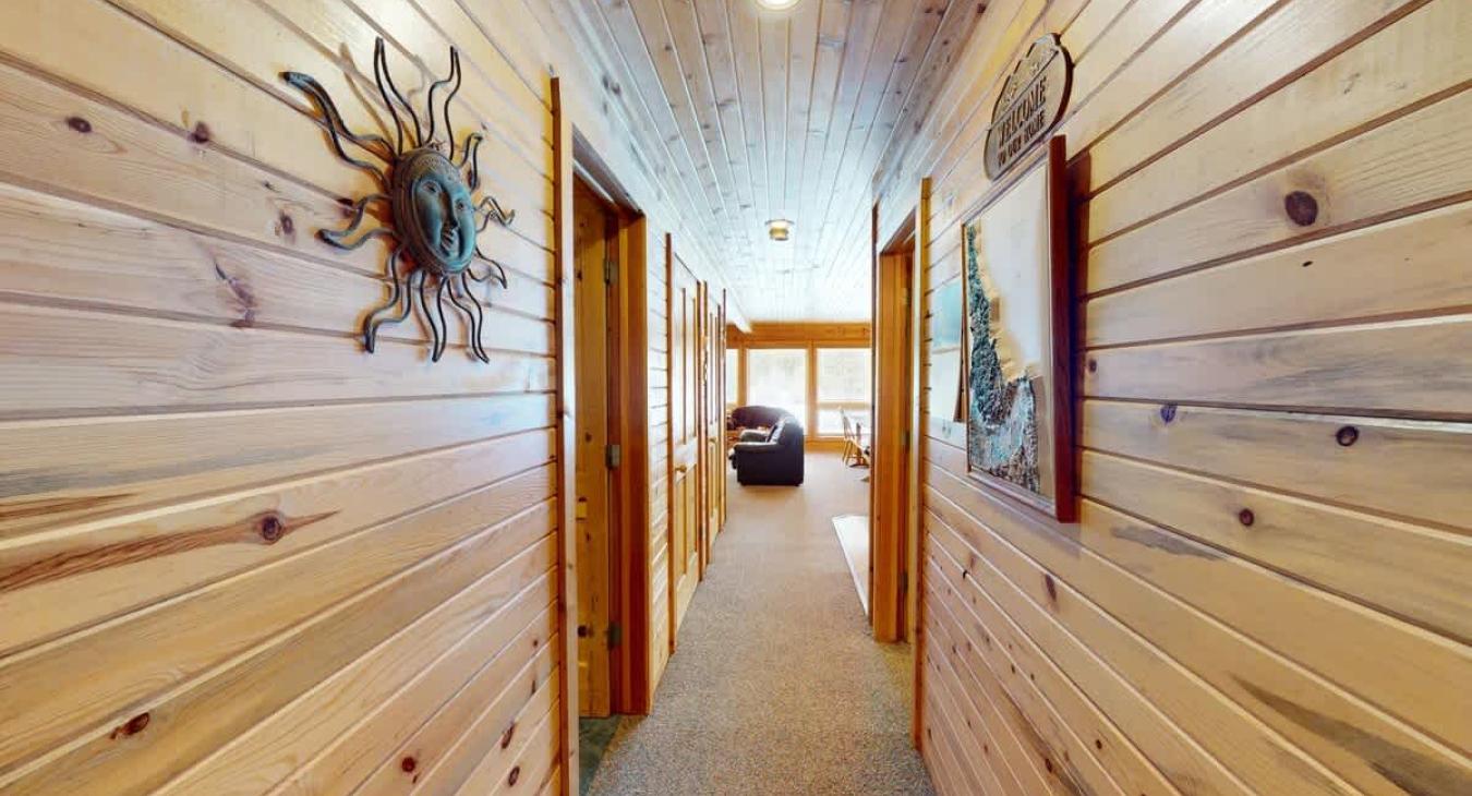 Hallway to access all the rooms and make your way to the upper level.