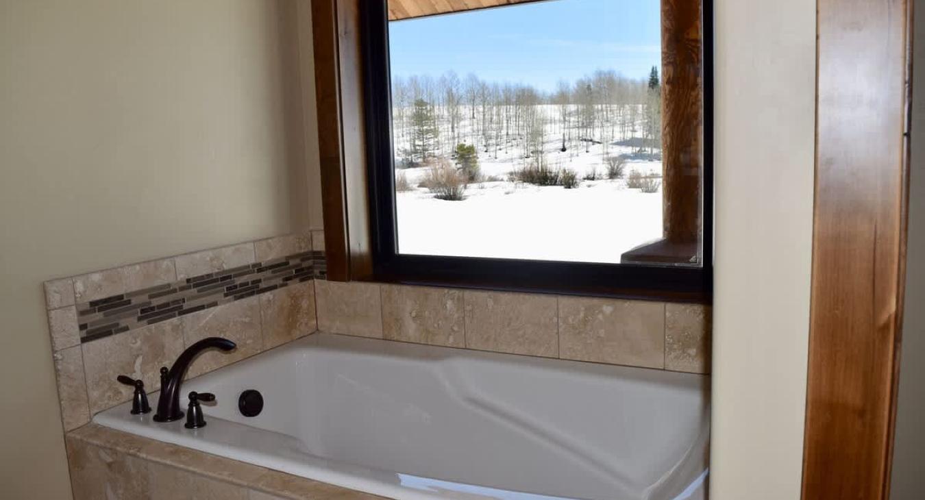 Soaking tub in the master bedroom.