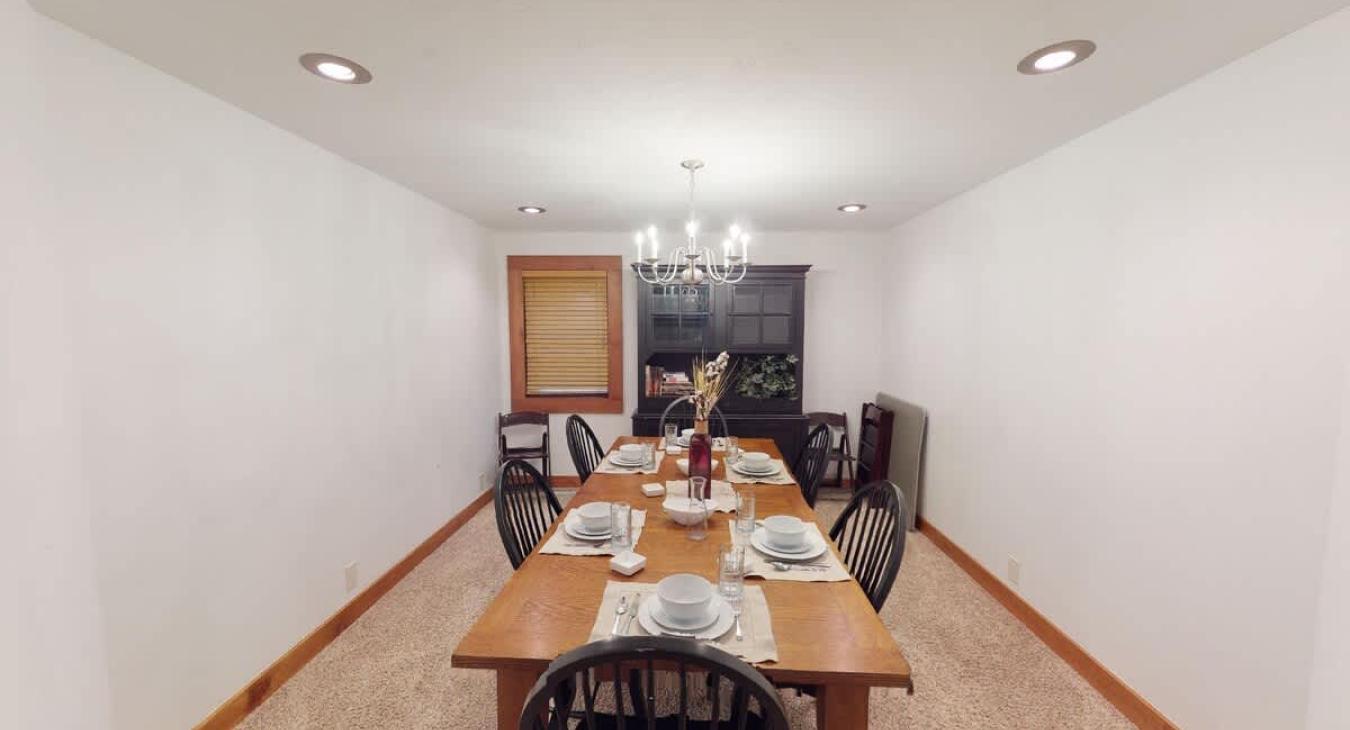 Dining room with table that seats up to 6 people.