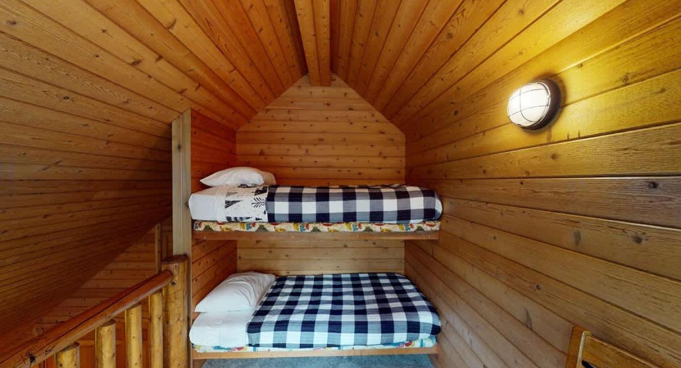 Ladder loft with twin size bunk beds.