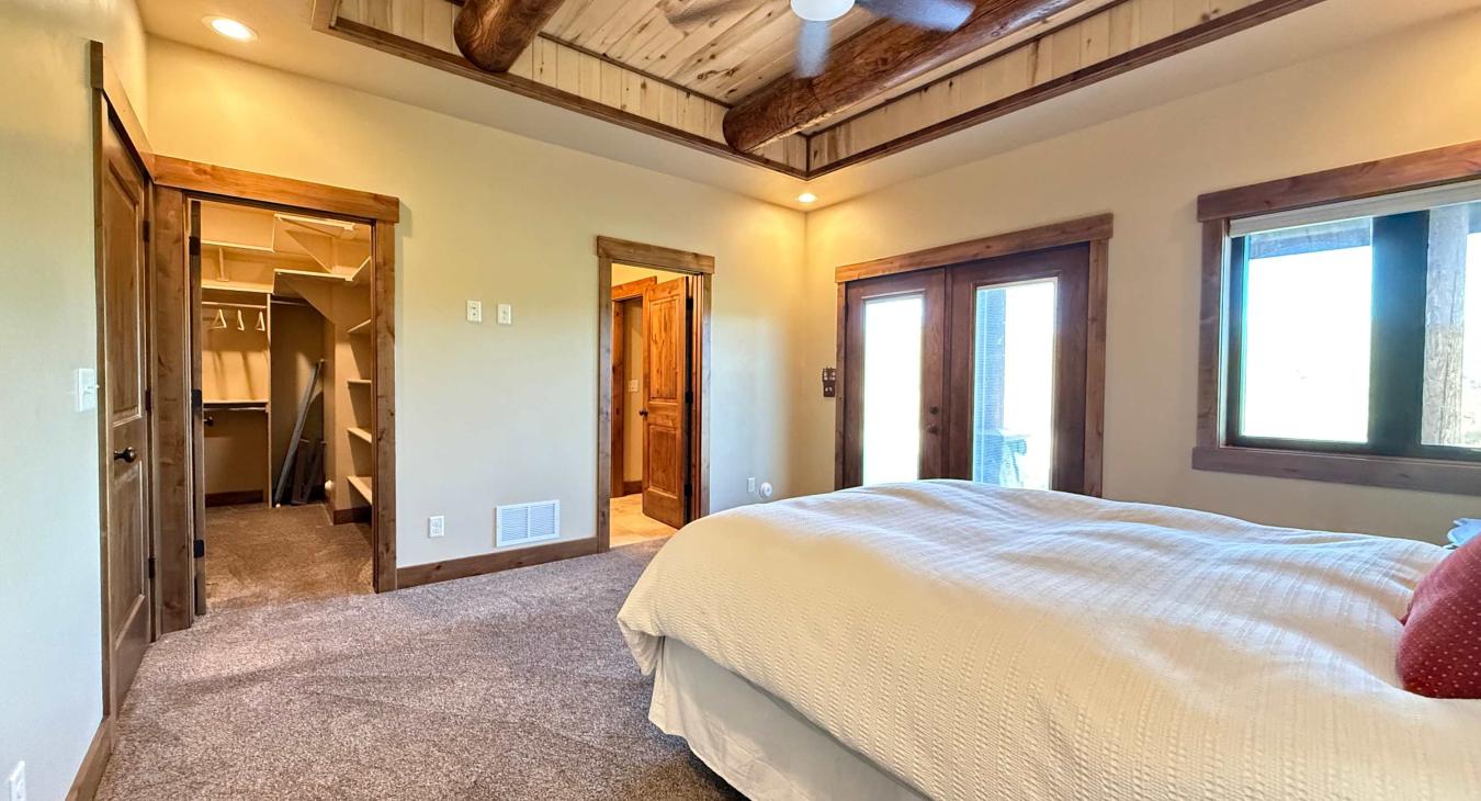 Mater bedroom with walk in closet and private bathroom.