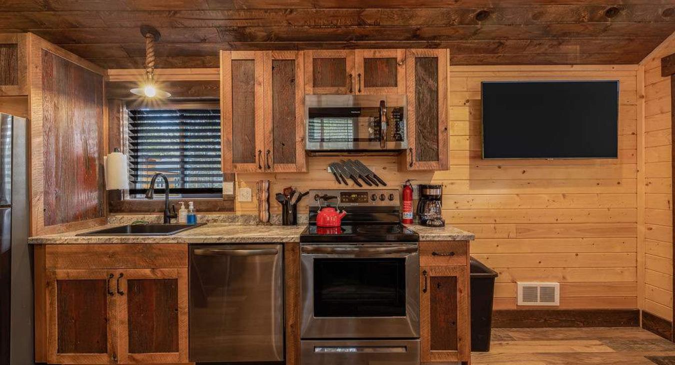 Kitchen and living room area is spacious for it being a tiny house.