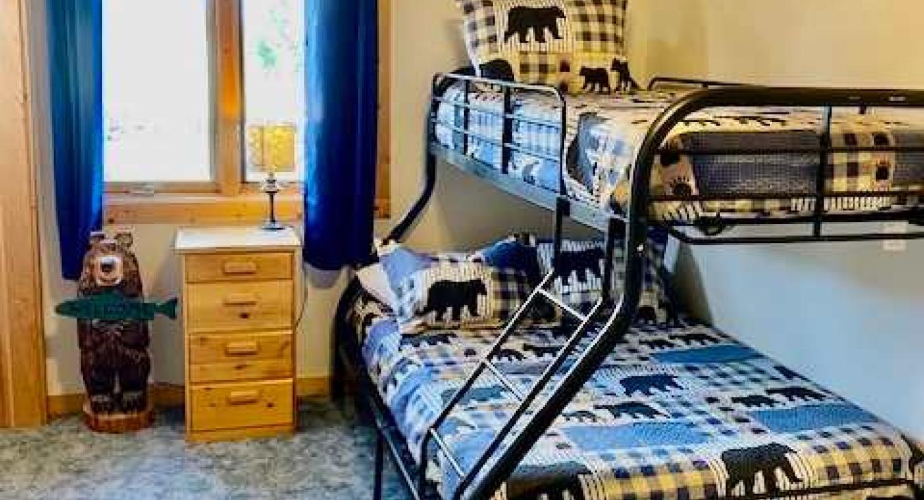 Bunkbed with full lower bed and twin upper.