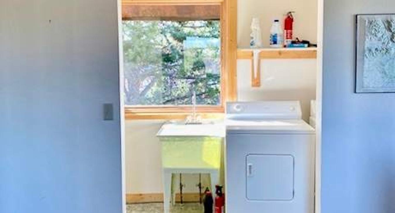 Laundry area with a sink.