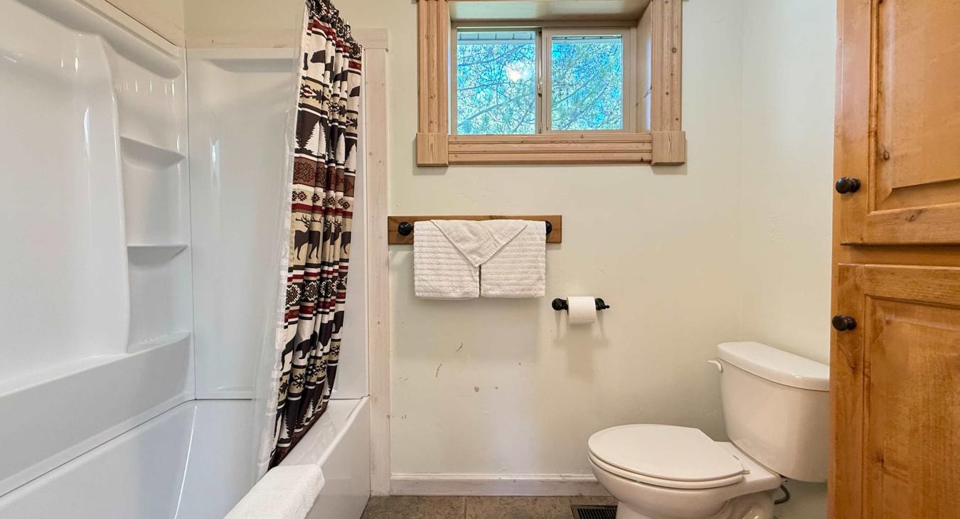 Loft bathroom with deep soaking tub.