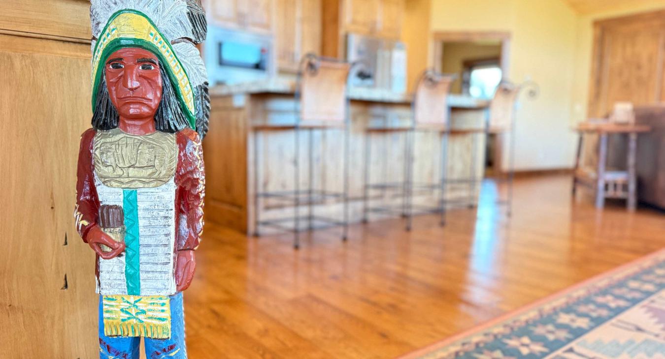 Indian carving with overview of the kitchen