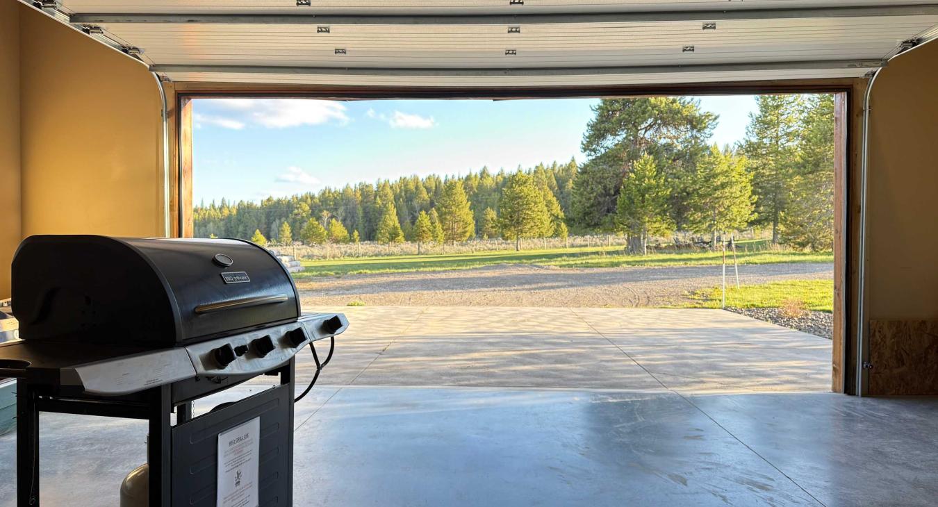 Large garage with BBQ for you to roll out to use.