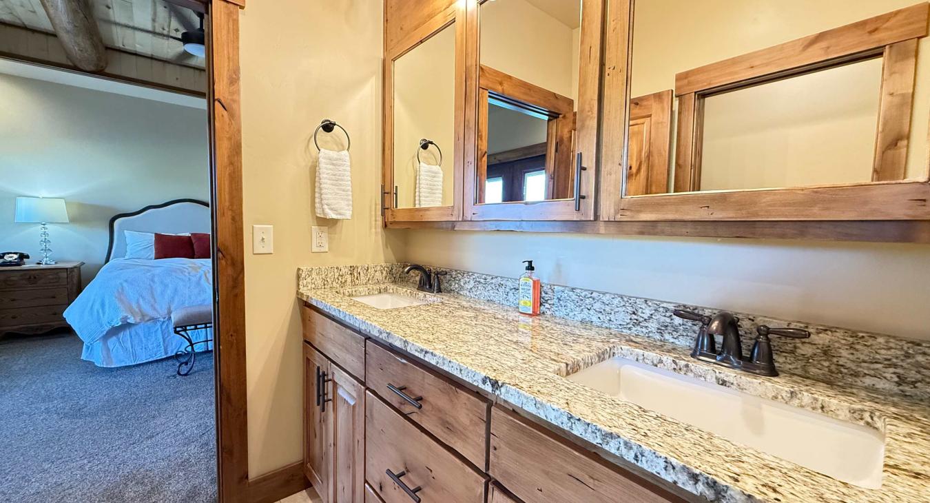 Ensuite Master bathroom with double vanity and standing shower.